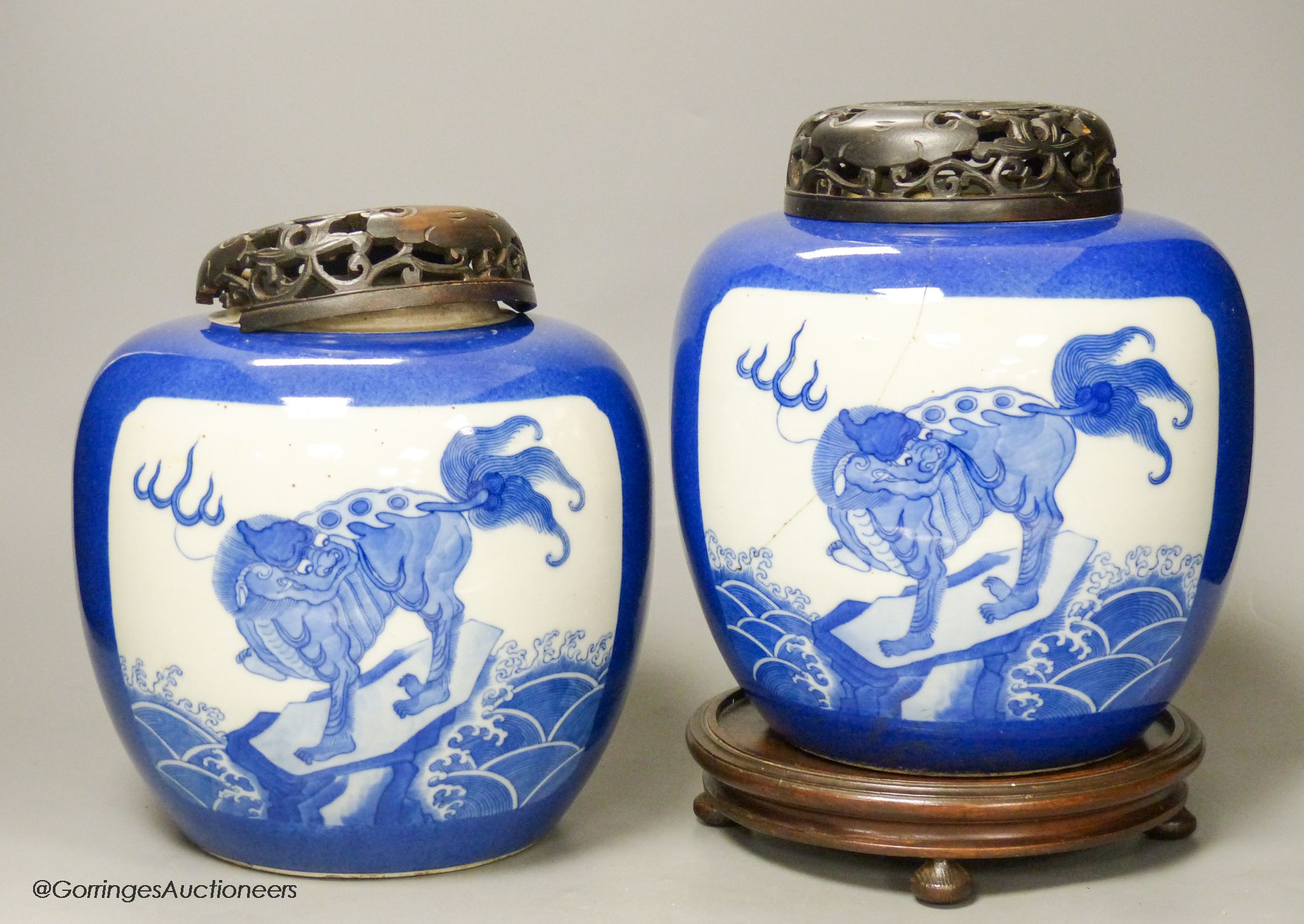 A pair of 19th century Chinese blue and white 'mythical beast' jars